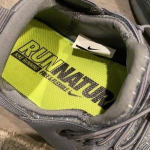 Brand new Nike running shoe, size 11. Elastic laces. Very lightweight.
